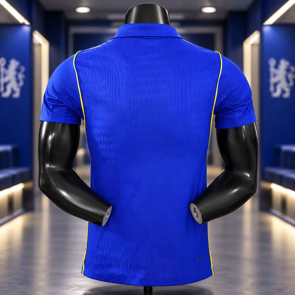 A royal blue short-sleeve polo shirt with yellow piping is displayed on a black mannequin from the back, set against a blurred blue locker-room style background with white lion emblems.