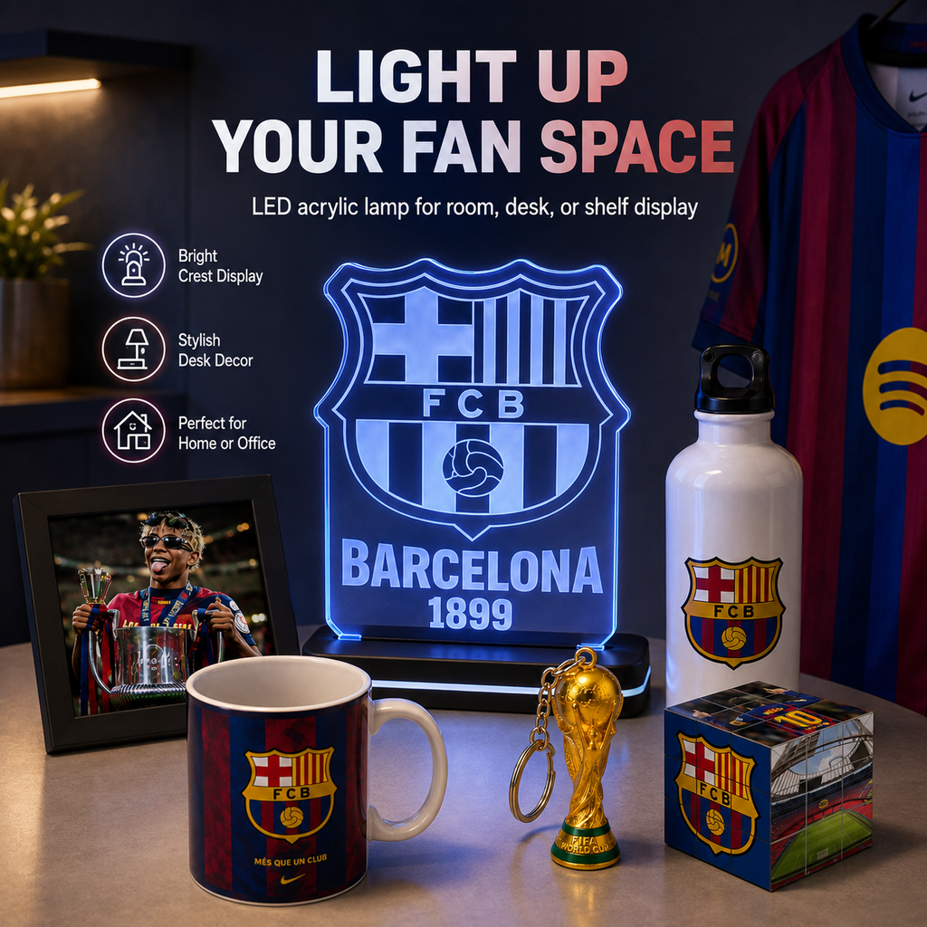 Barcelona FC LED acrylic light sign displayed on a desk alongside matching merchandise, including a white water bottle, a mug, a framed photo, a small trophy keychain, and a cube-shaped decor piece. The scene includes promotional text highlighting the bright acrylic lamp for room, desk, or shelf display.