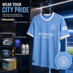 A light blue Manchester City football jersey hanging on a black hanger inside a dark display closet. The shirt has white trim, the Manchester City crest on the chest, 'ETIHAD AIRWAYS' sponsor text across the front, and a white number 1 on the sleeve.