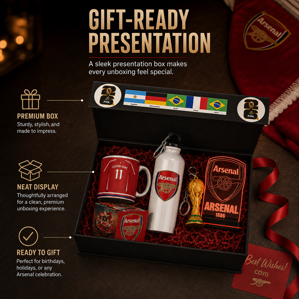Arsenal-themed gift set presented in a black box with red lining, including a red football mug, white water bottle, glass, keychain, and small trophy replica, with promotional text and Arsenal branding around it.