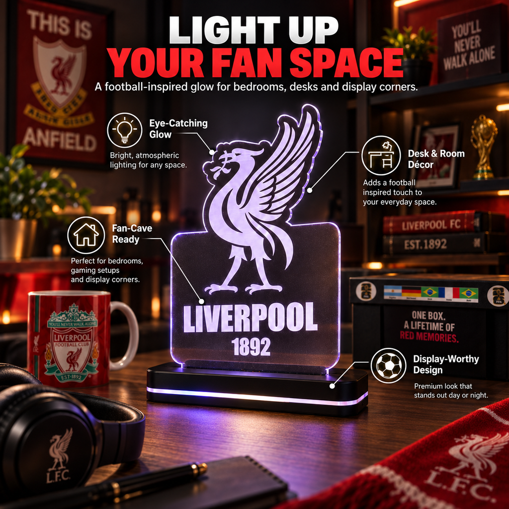 A Liverpool FC illuminated acrylic desk lamp with the club's gull logo and 'LIVERPOOL 1892' text, shown lit on a desk in a room setting with overlaid marketing callouts and surrounding football-themed decor.